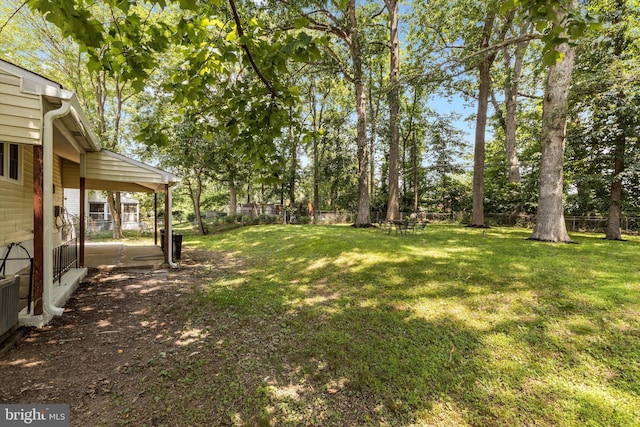 423 Highmeadow Rd, Reisterstown, MD 21136 - fenced backyard with view of wooded area