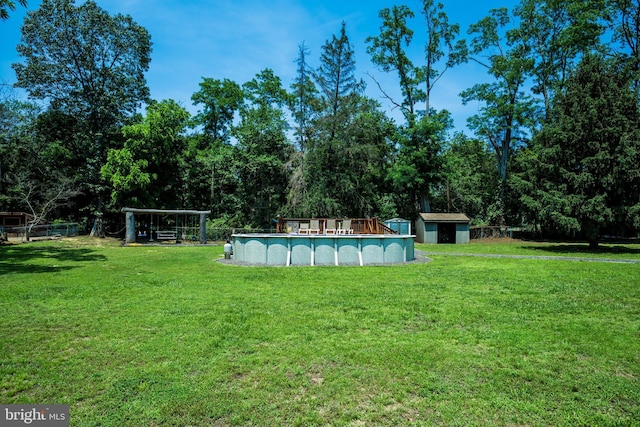674 Good Intent Rd, Blackwood, NJ 08012 - view of grassy yard with a storage unit and an outdoor pool