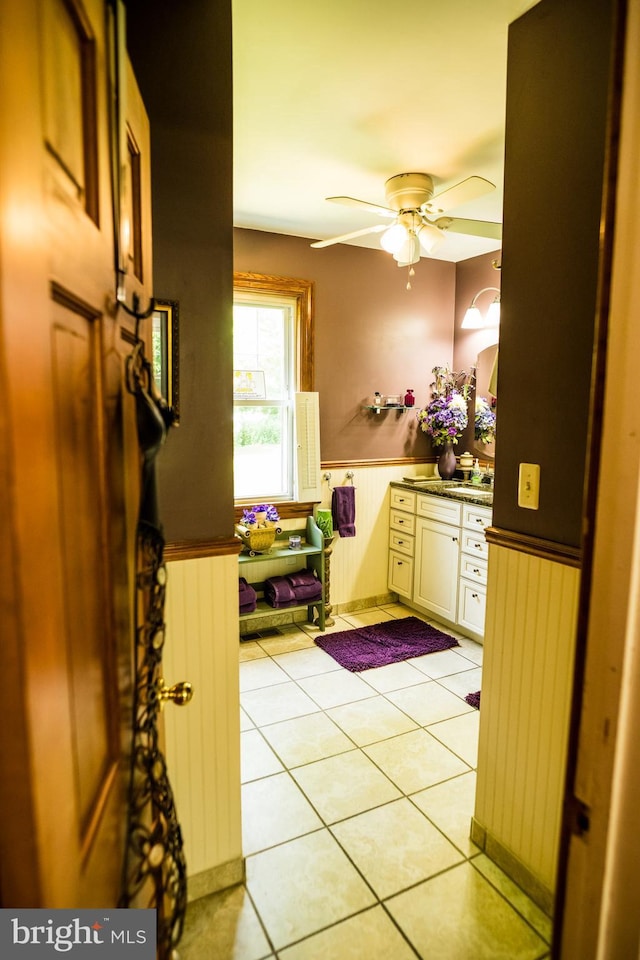 674 Good Intent Rd, Blackwood, NJ 08012 - kitchen with a wainscoted wall, light tile patterned floors, and a ceiling fan