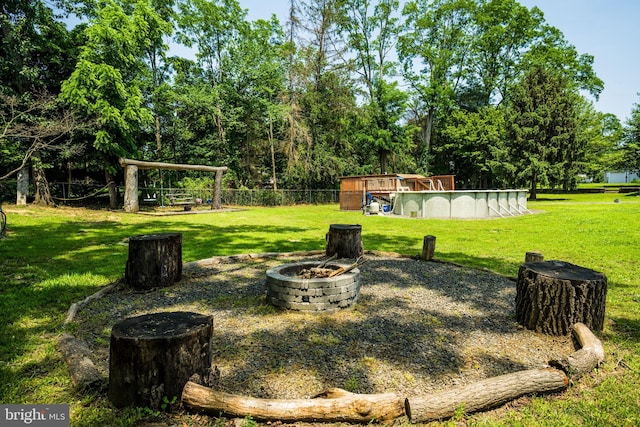 674 Good Intent Rd, Blackwood, NJ 08012 - view of grassy yard with a fire pit and an outdoor pool