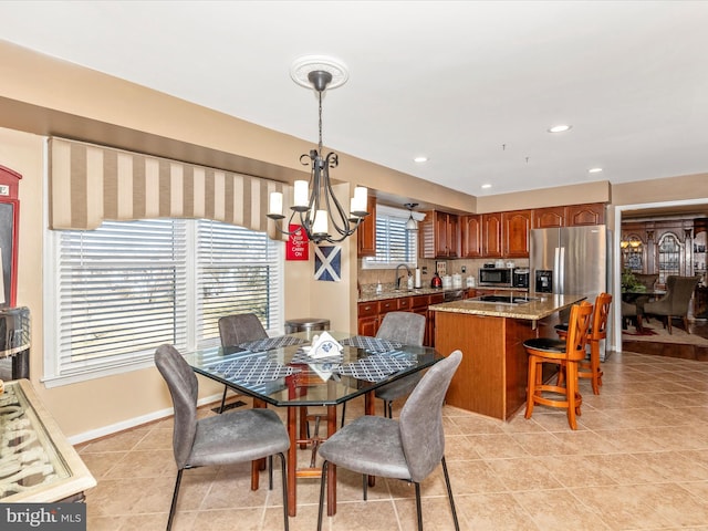 6108 Fieldcrest Dr, Frederick, MD 21701 - dining room with a chandelier, light tile patterned floors, and recessed lighting