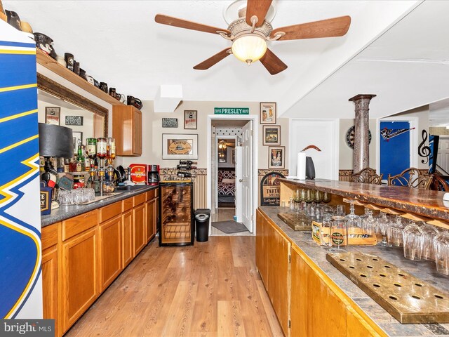 6108 Fieldcrest Dr, Frederick, MD 21701 - indoor wet bar featuring a ceiling fan and light wood-style floors