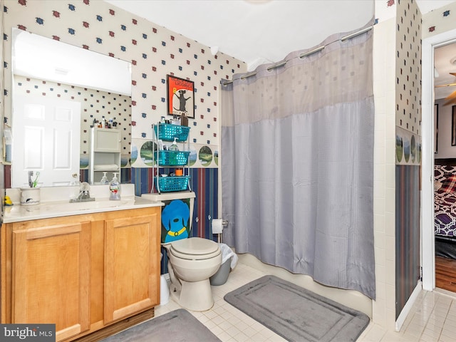6108 Fieldcrest Dr, Frederick, MD 21701 - full bathroom featuring wallpapered walls, vanity, and tile patterned floors