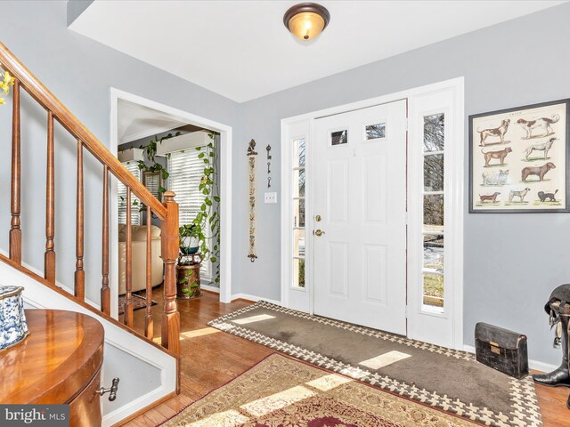 6108 Fieldcrest Dr, Frederick, MD 21701 - entryway with stairway and wood finished floors