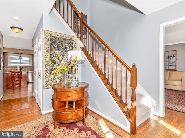 6108 Fieldcrest Dr, Frederick, MD 21701 - stairs with hardwood / wood-style flooring and baseboards