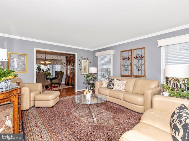 6108 Fieldcrest Dr, Frederick, MD 21701 - living area with ornamental molding, a chandelier, and wood finished floors