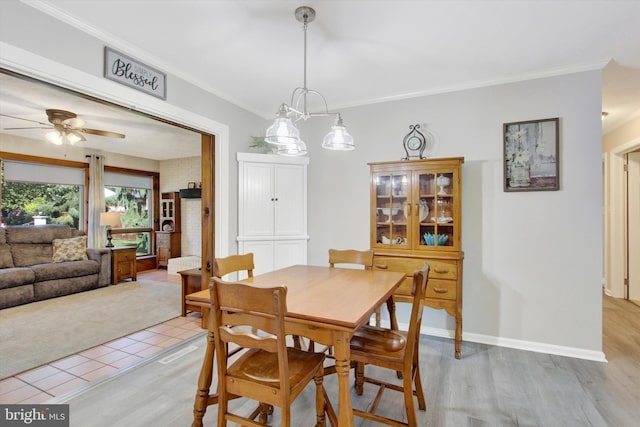 106 Mumma Ave, Hanover, PA 17331 - dining area with ornamental molding, ceiling fan, and light wood finished floors