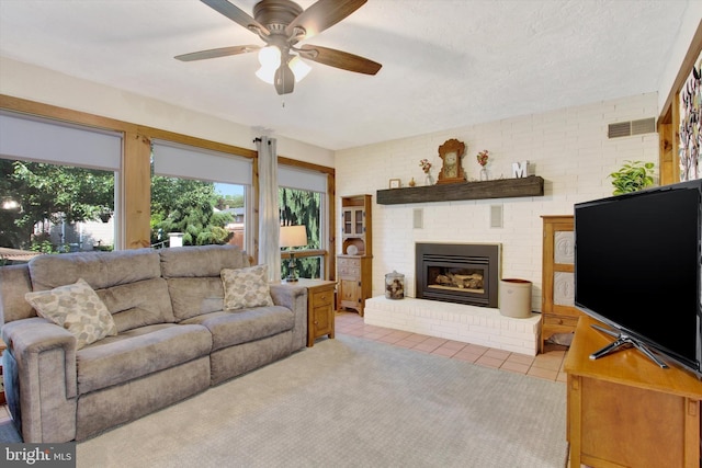 106 Mumma Ave, Hanover, PA 17331 - tiled living area featuring a ceiling fan and a fireplace