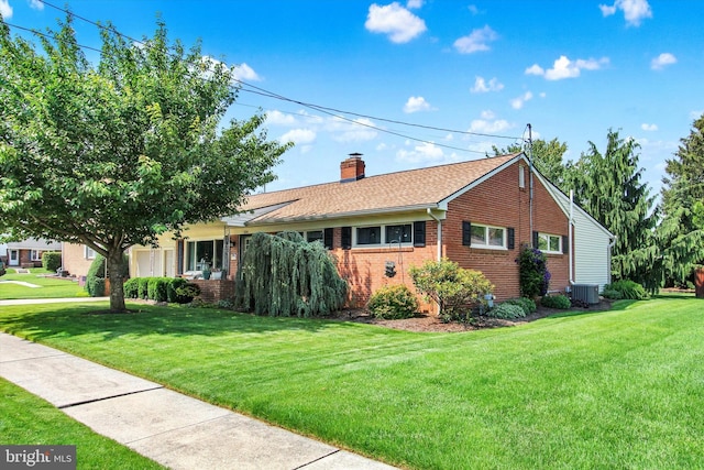 106 Mumma Ave, Hanover, PA 17331 - ranch-style house with brick siding, a front lawn, a chimney, and a shingled roof