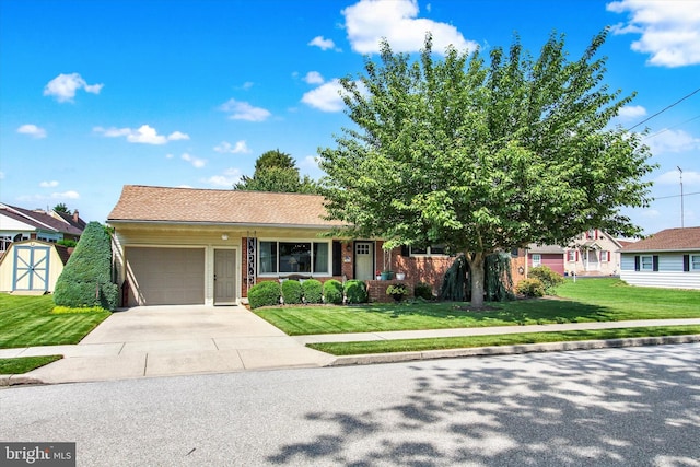 106 Mumma Ave, Hanover, PA 17331 - single story home featuring a garage, a front yard, concrete driveway, and brick siding