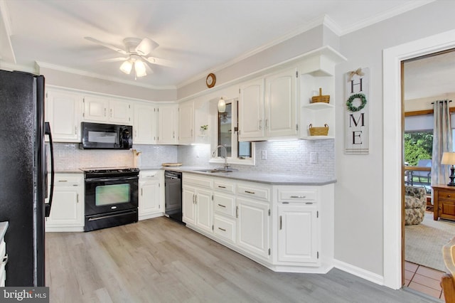 106 Mumma Ave, Hanover, PA 17331 - kitchen featuring black appliances, ceiling fan, light wood finished floors, white cabinetry, and ornamental molding