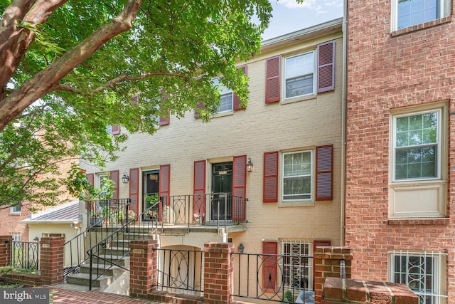 1618 Belmont St NW Unit D, Washington, DC 20009 - townhome / multi-family property with brick siding