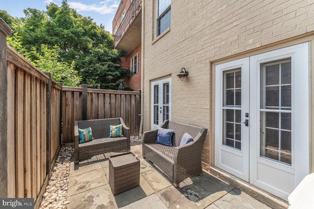 1618 Belmont St NW Unit D, Washington, DC 20009 - fenced backyard with french doors, a patio, and outdoor lounge area