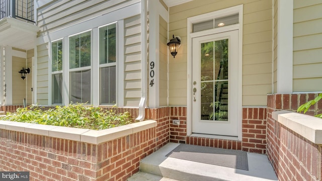 904 Joseph Johnson Dr, Annapolis, MD 21401 - doorway to property featuring brick siding and a porch