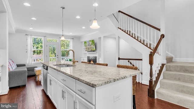 904 Joseph Johnson Dr, Annapolis, MD 21401 - kitchen featuring light stone counters, open floor plan, white cabinets, pendant lighting, and recessed lighting
