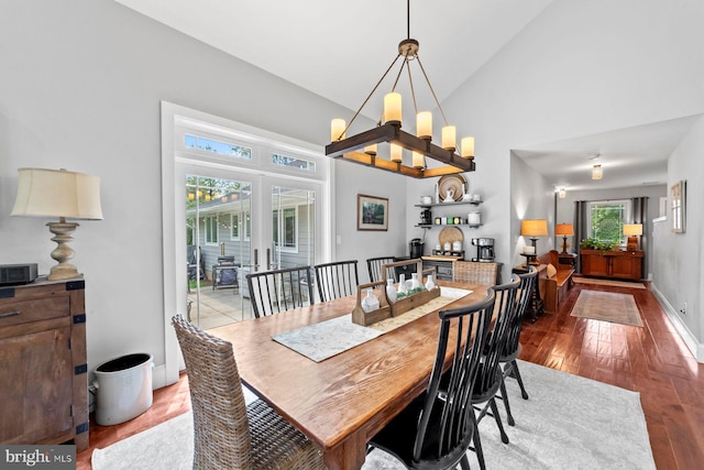 65 Shady Brook Ln, Princeton, NJ 08540 - dining space featuring wood finished floors, high vaulted ceiling, french doors, and a chandelier