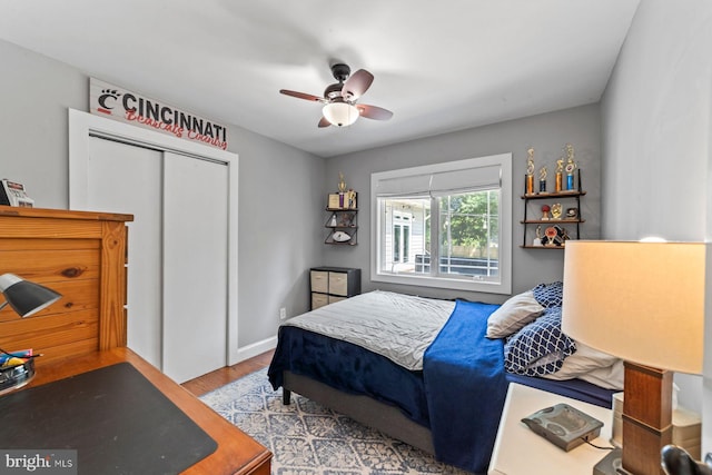65 Shady Brook Ln, Princeton, NJ 08540 - bedroom with a closet, wood finished floors, and a ceiling fan