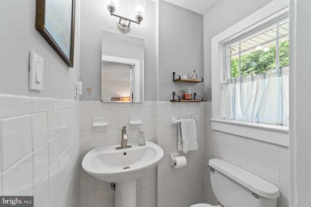 65 Shady Brook Ln, Princeton, NJ 08540 - half bathroom with tile walls and a wainscoted wall
