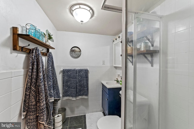 65 Shady Brook Ln, Princeton, NJ 08540 - bathroom featuring tile walls, vanity, a shower stall, tile patterned flooring, and a wainscoted wall