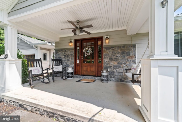 65 Shady Brook Ln, Princeton, NJ 08540 - entrance to property with covered porch, stone siding, and a ceiling fan