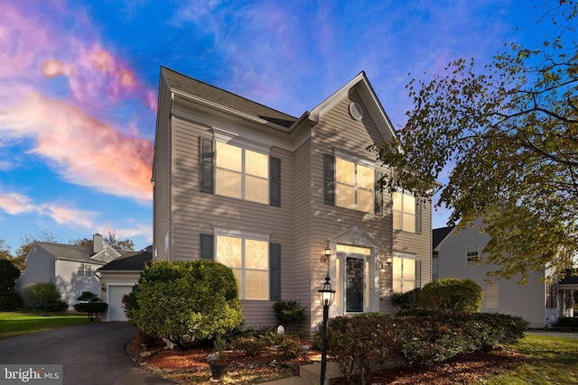 25336 Ripleys Field Dr, Chantilly, VA 20152 - traditional home featuring asphalt driveway and a garage
