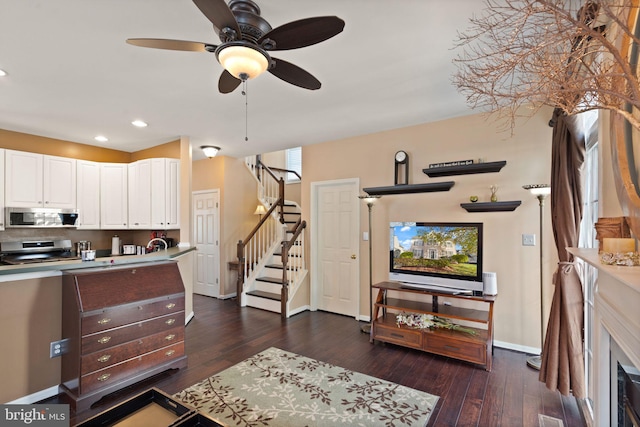 25336 Ripleys Field Dr, Chantilly, VA 20152 - living area with dark wood-style flooring, stairway, a ceiling fan, and recessed lighting
