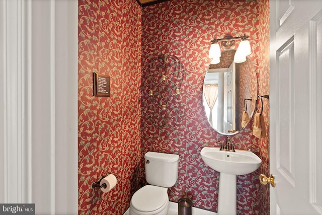 25336 Ripleys Field Dr, Chantilly, VA 20152 - half bath featuring wallpapered walls and toilet