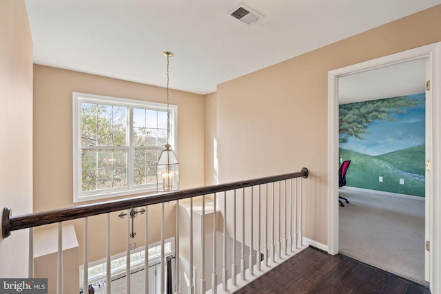 25336 Ripleys Field Dr, Chantilly, VA 20152 - corridor with dark wood-style flooring and an upstairs landing
