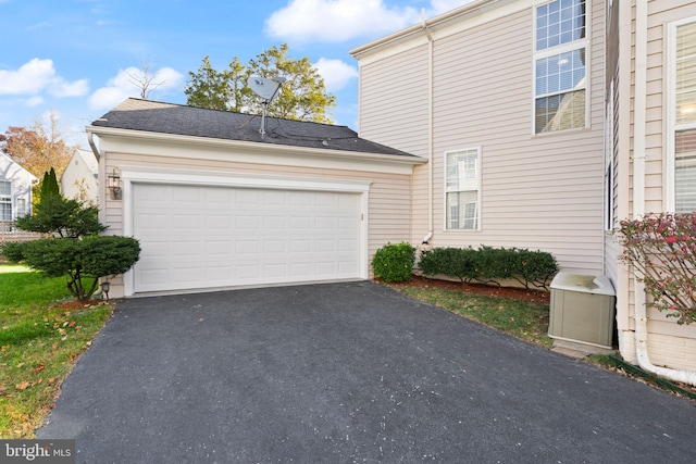 25336 Ripleys Field Dr, Chantilly, VA 20152 - view of property exterior featuring driveway and a garage