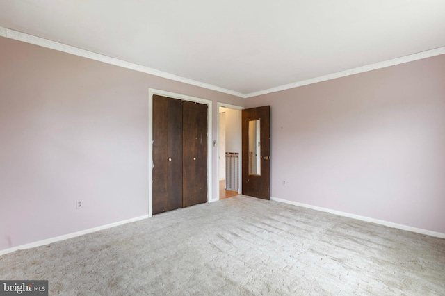 21 Jerrys Ave, Clayton, NJ 08312 - unfurnished bedroom with crown molding, a closet, and carpet floors