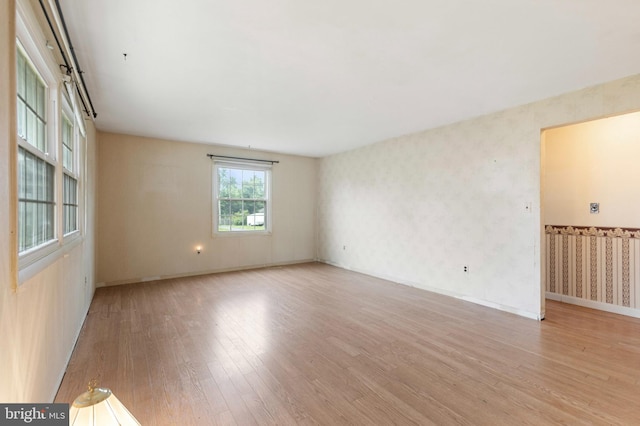 21 Jerrys Ave, Clayton, NJ 08312 - unfurnished room featuring light wood-type flooring and wallpapered walls