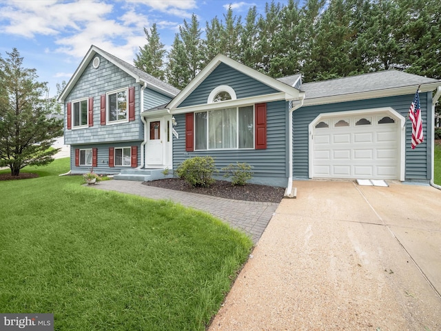 6250 Fairbourne Ct, Hanover, MD 21076 - tri-level home with a garage, concrete driveway, and a front lawn