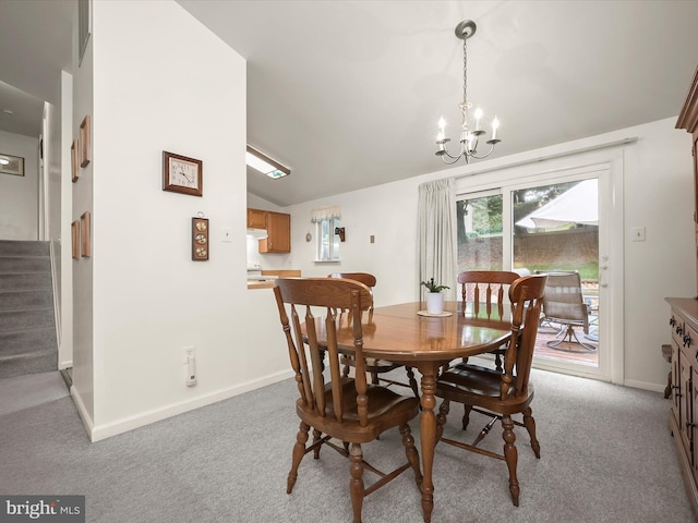 6250 Fairbourne Ct, Hanover, MD 21076 - dining area featuring light carpet, a chandelier, vaulted ceiling, and stairway