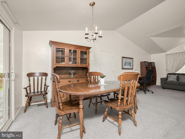 6250 Fairbourne Ct, Hanover, MD 21076 - dining room with light colored carpet, vaulted ceiling, and a chandelier