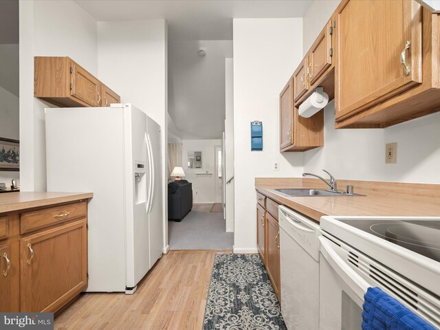 6250 Fairbourne Ct, Hanover, MD 21076 - kitchen with white appliances, light wood-type flooring, and light countertops