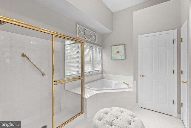 43251 Brownstone Ct, Ashburn, VA 20147 - bathroom with a garden tub, a shower stall, and tile patterned flooring