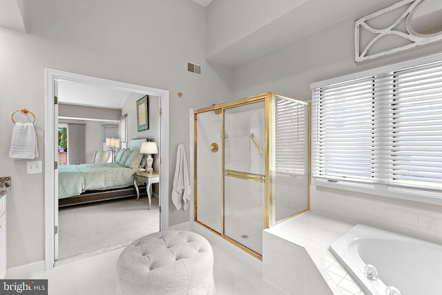 43251 Brownstone Ct, Ashburn, VA 20147 - bathroom featuring ensuite bath, a garden tub, and a shower stall