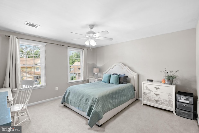 43251 Brownstone Ct, Ashburn, VA 20147 - bedroom with light colored carpet and a ceiling fan