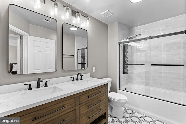 43251 Brownstone Ct, Ashburn, VA 20147 - bathroom with double vanity and shower / bath combination with glass door