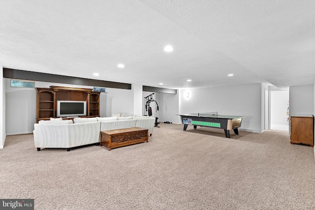 43251 Brownstone Ct, Ashburn, VA 20147 - living area with carpet, a textured ceiling, and recessed lighting