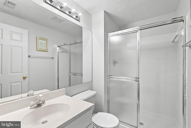 43251 Brownstone Ct, Ashburn, VA 20147 - full bath with a textured ceiling, a shower stall, and vanity