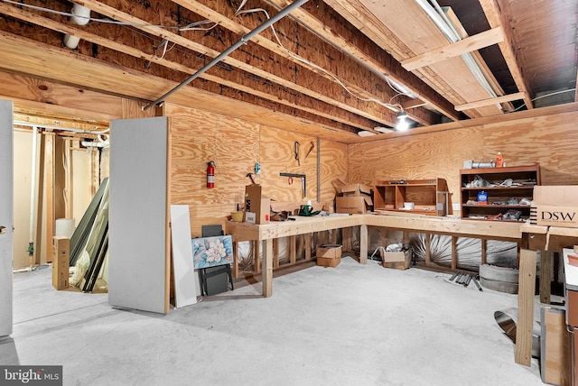43251 Brownstone Ct, Ashburn, VA 20147 - unfinished basement with a workshop area