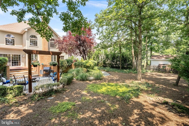 43251 Brownstone Ct, Ashburn, VA 20147 - view of yard featuring a patio