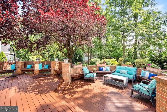 43251 Brownstone Ct, Ashburn, VA 20147 - wooden terrace with outdoor lounge area and view of scattered trees
