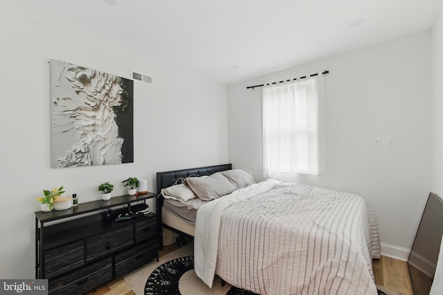 2246 N Hancock St, Philadelphia, PA 19133 - bedroom featuring wood finished floors and baseboards