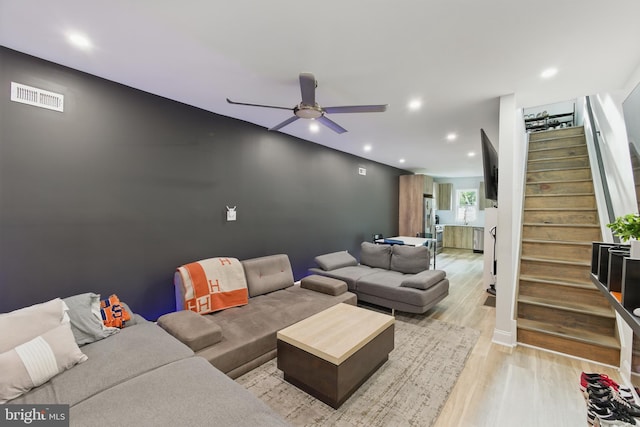 2246 N Hancock St, Philadelphia, PA 19133 - living room with light wood-style flooring, stairs, a ceiling fan, and recessed lighting