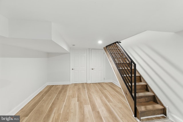 2246 N Hancock St, Philadelphia, PA 19133 - finished basement with light wood-type flooring, stairs, and recessed lighting