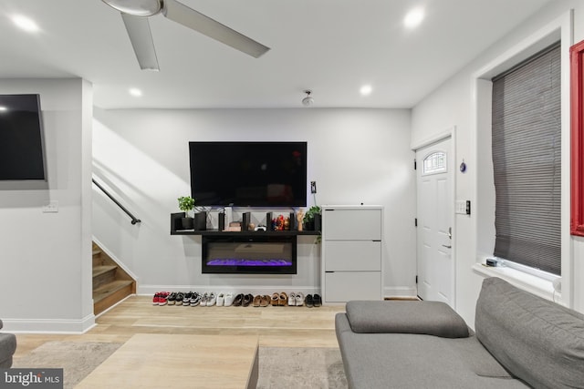 2246 N Hancock St, Philadelphia, PA 19133 - living room with wood finished floors, stairs, recessed lighting, ceiling fan, and a glass covered fireplace