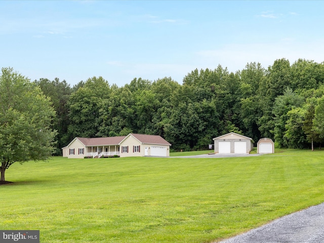 364 Stoney Bottom Rd, Front Royal, VA 22630 - view of front of house featuring a garage, a front lawn, and an outbuilding