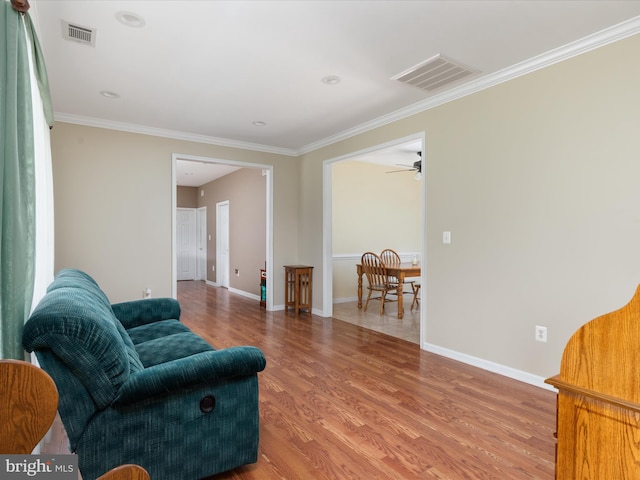 364 Stoney Bottom Rd, Front Royal, VA 22630 - living room with wood finished floors, ornamental molding, and ceiling fan